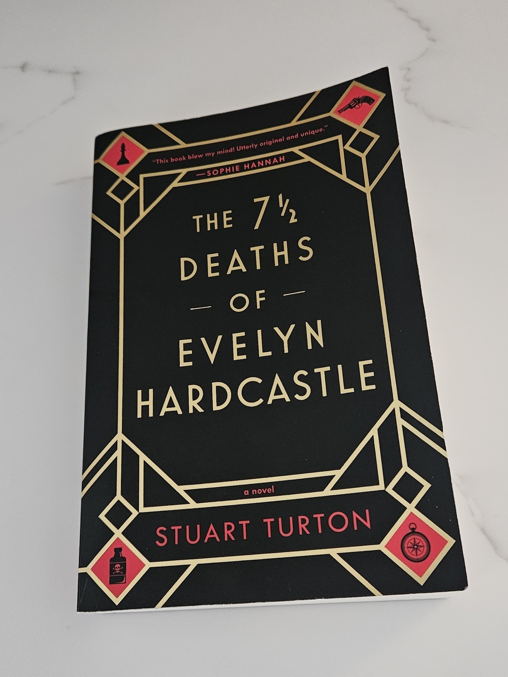 The 7 1/2 Deaths of Evelyn Hardcastle – Black & Gold Edition by